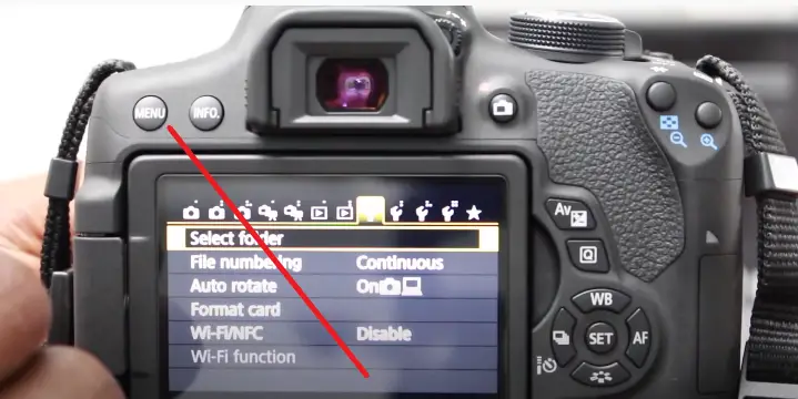 Open the menu on the Canon camera and choose "Settings."
