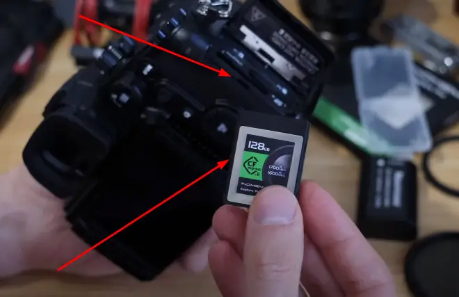 insert a memory card into the camera