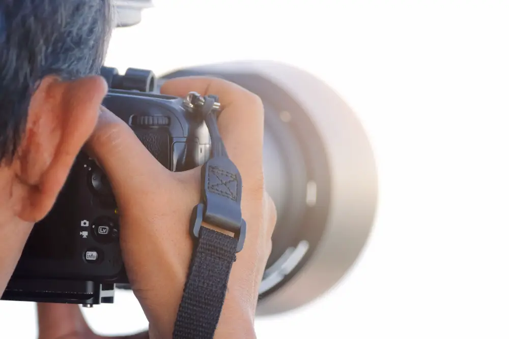 How to put a strap on a canon camera