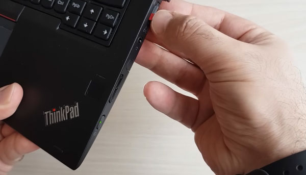 Insert the memory card into your laptop or PC